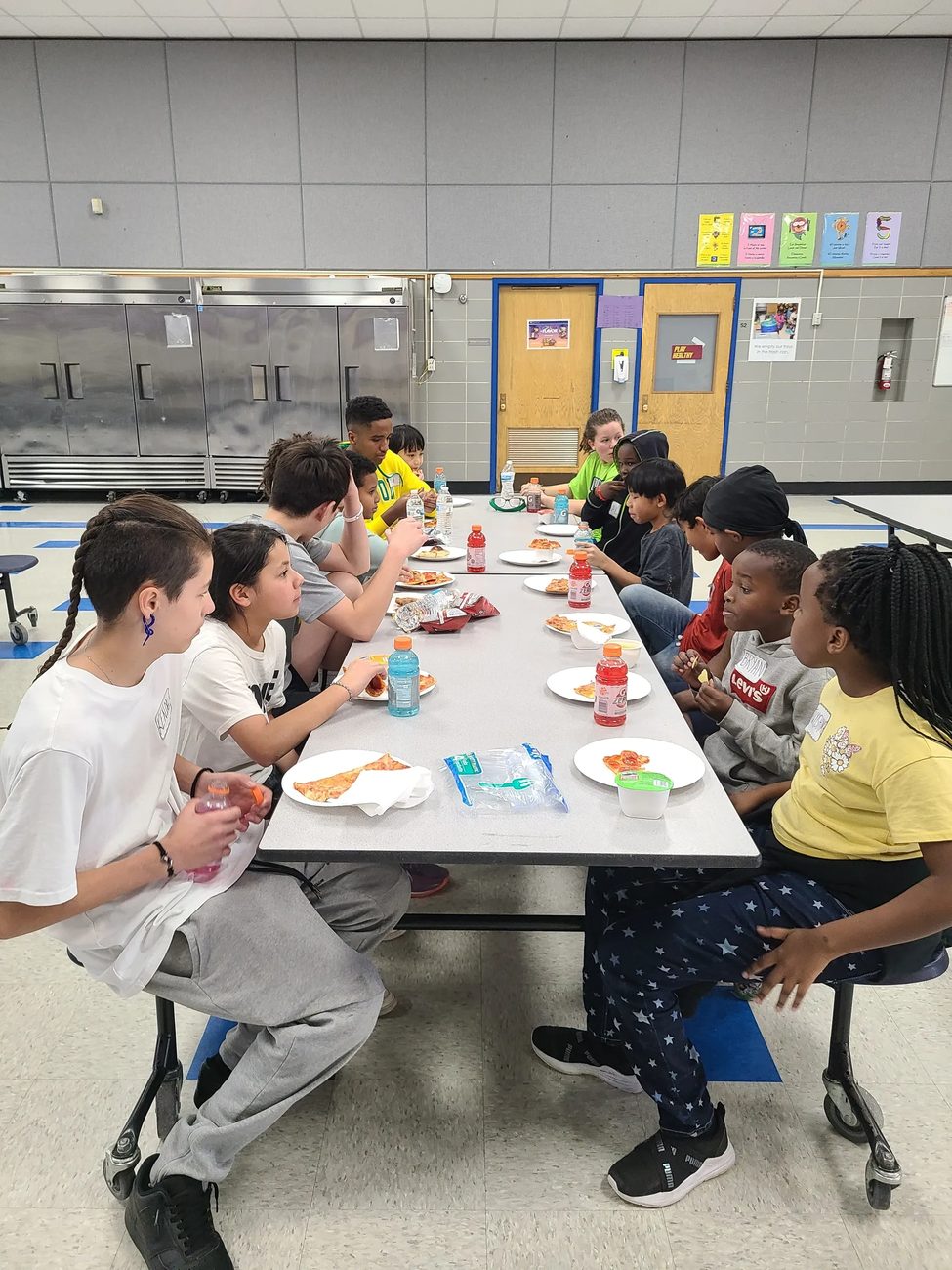 Campers sharing a meal together